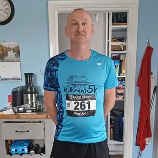 Gerard with a Kilkenny 5K race bib