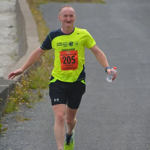 Gerard running the Cork City Marathon in hi-vis kit